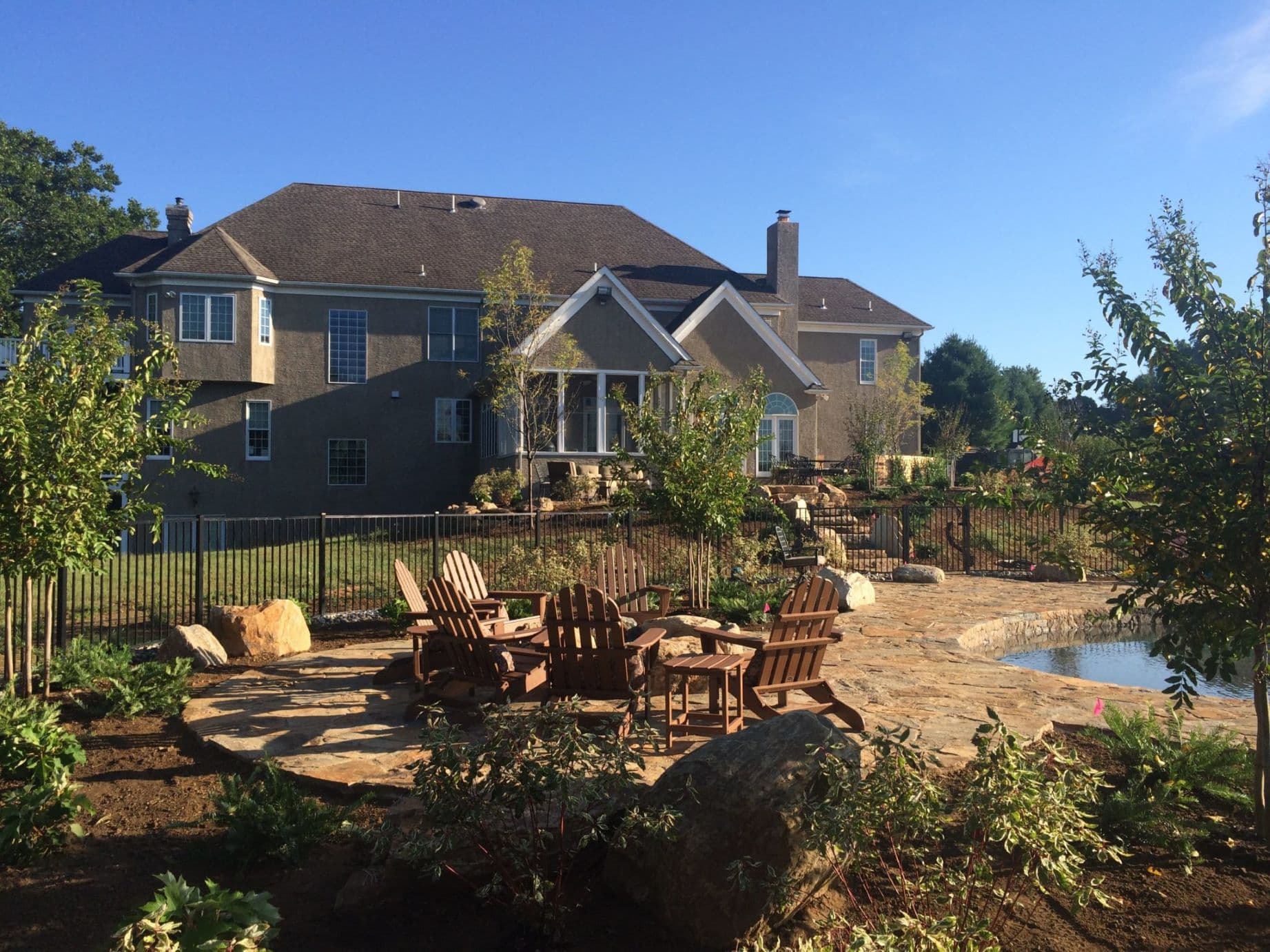 Natural stone terrace and pool landscape in the Brandywine tradition