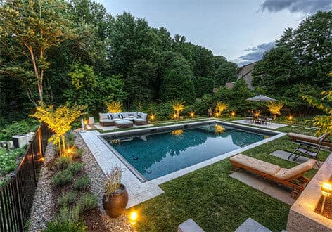 Evening lighting on a quiet rectangular pool