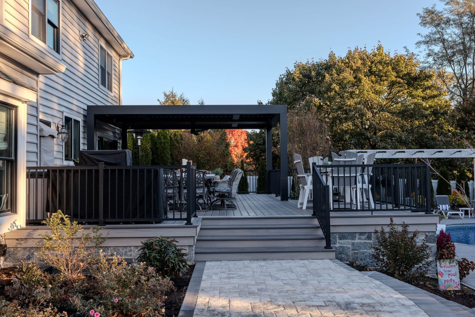 Deck and pergola connecting the house to the water