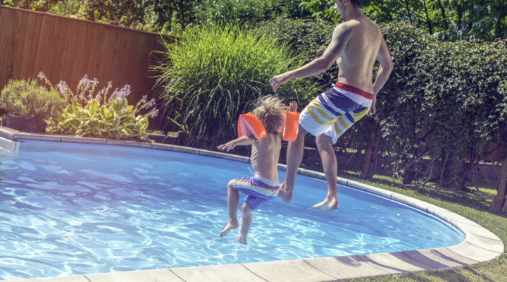 Father and son jumping
